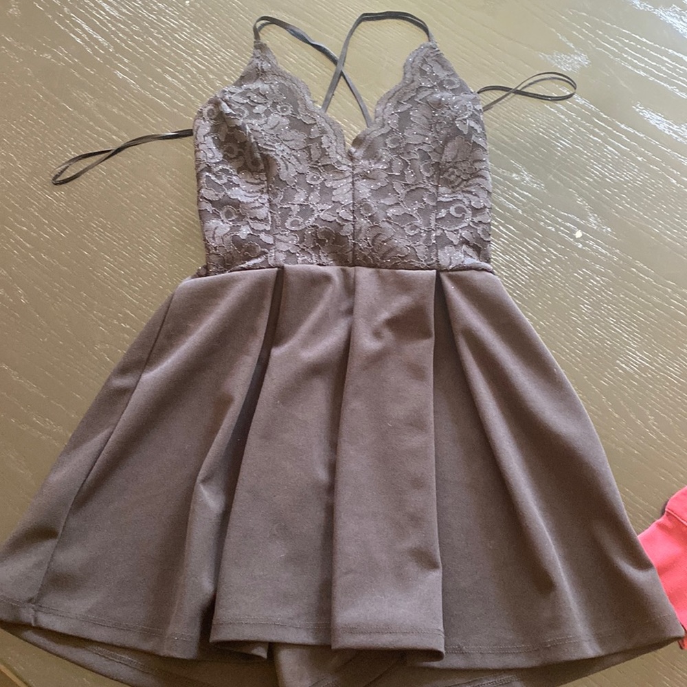 Black small Windsor dress/ romper.